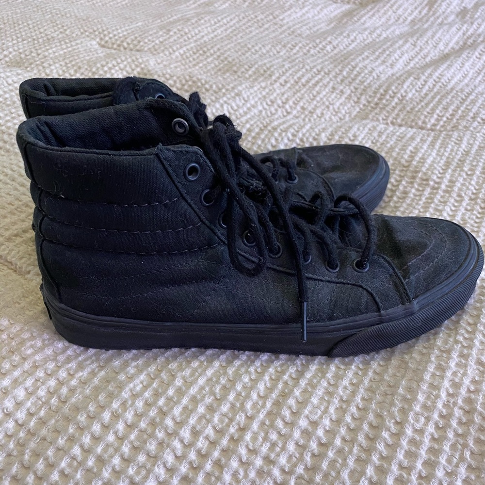 All black vans high tops